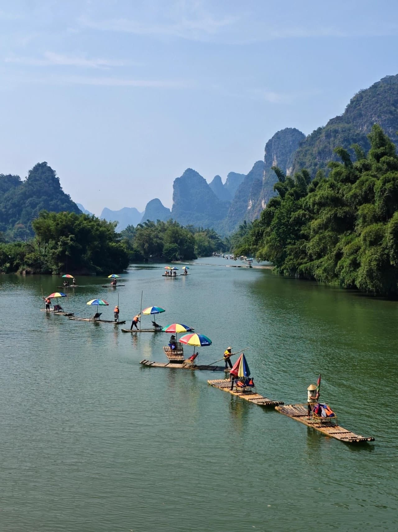Li River at dawn — misty mountains in still waters