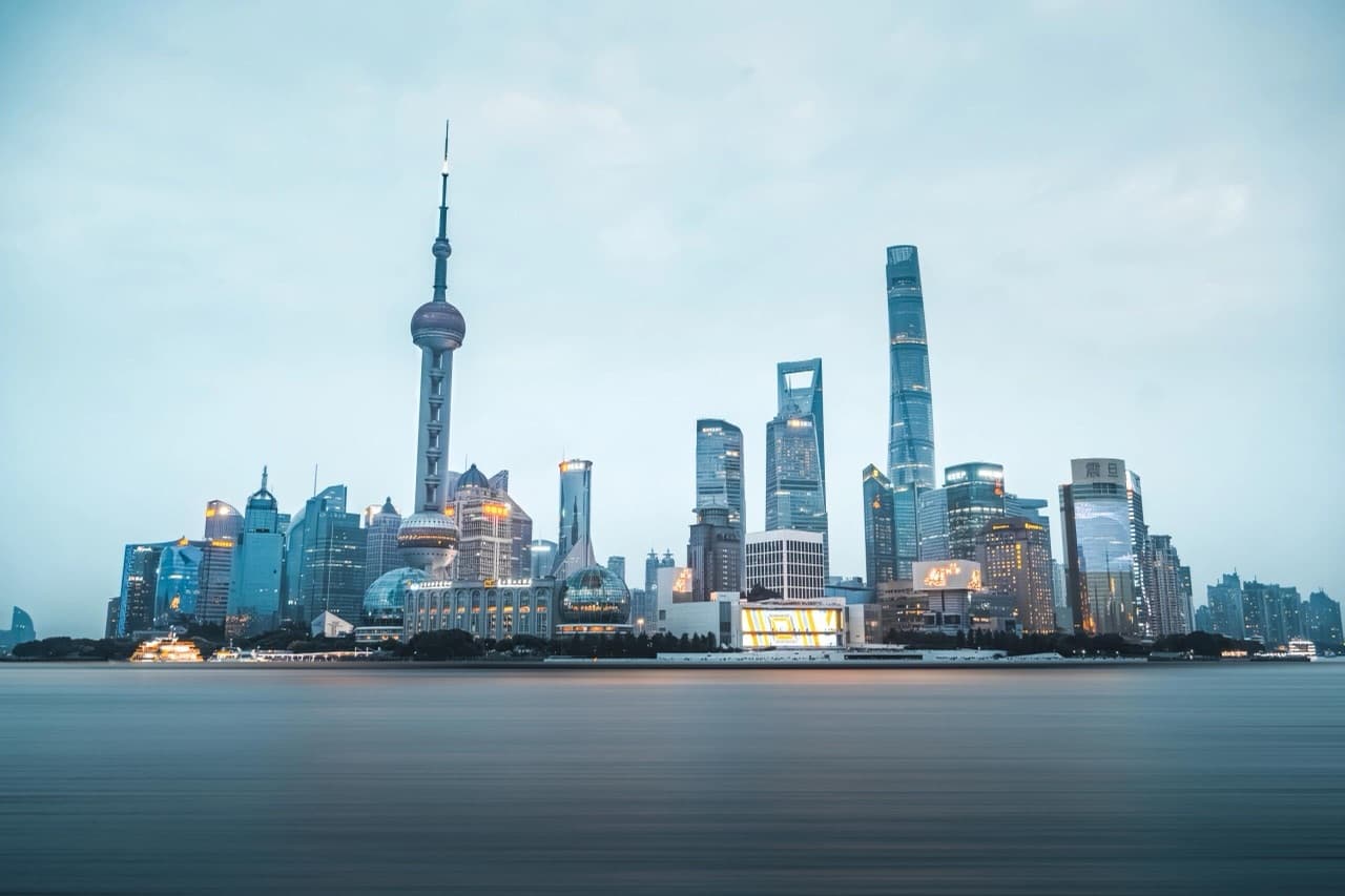The Bund at night — colonial architecture meets Pudong lights